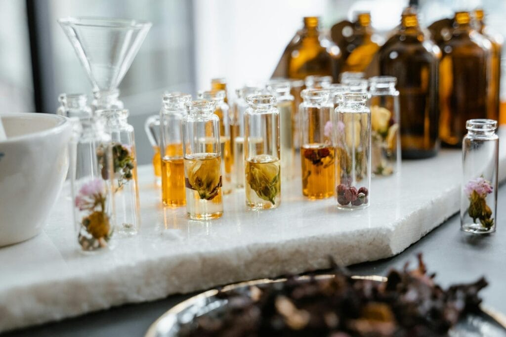 clear glass bottles on white surface